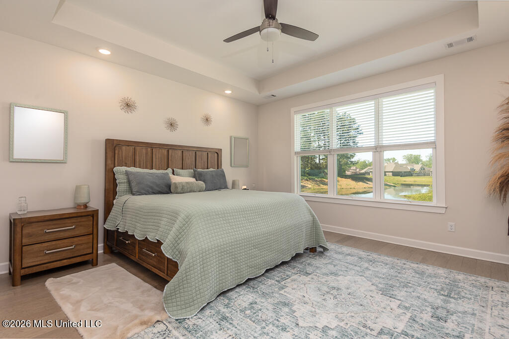 467 Ruskin Loop Hernando, MS 38632 - Photo 16 of 28 Primary Bedroom w/view of pond