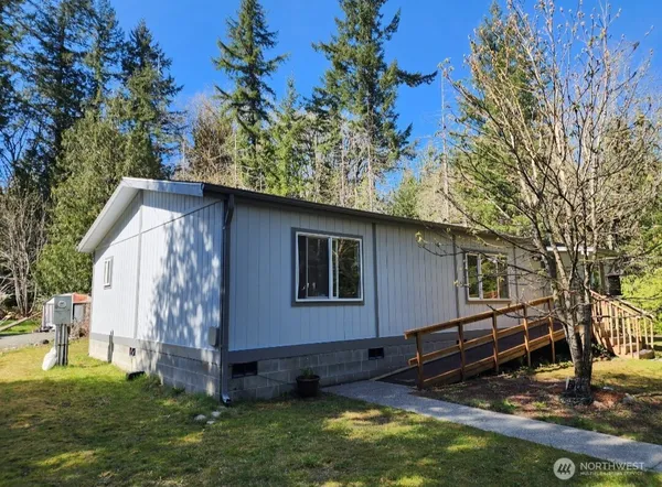 a backyard of a house with lots of green space