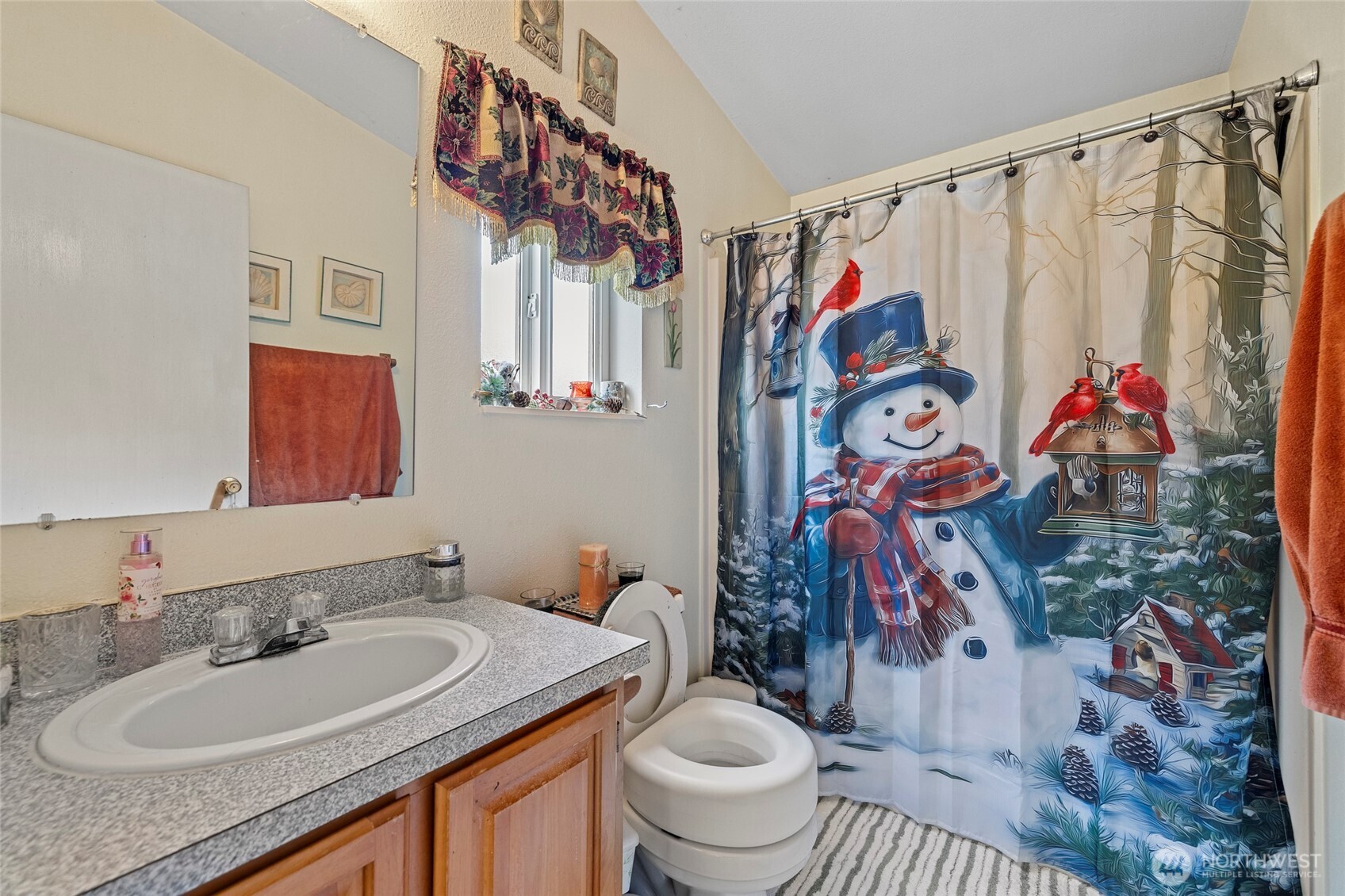 42041 Cedar Street Concrete, WA 98237 - Photo 22 of 33 a bathroom with a sink toilet and shower curtain