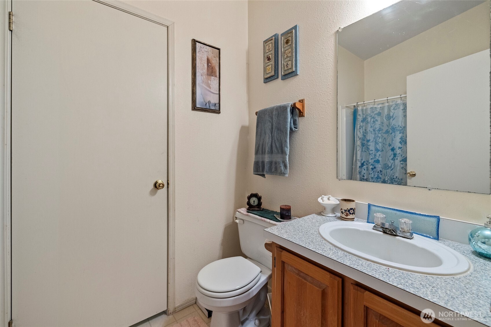42041 Cedar Street Concrete, WA 98237 - Photo 24 of 33 a bathroom with a granite countertop toilet sink and mirror