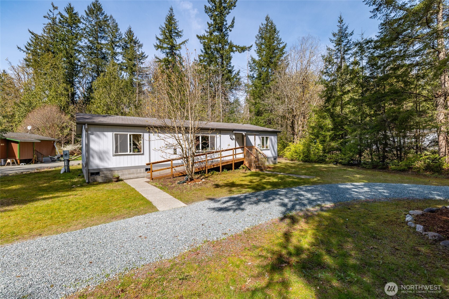42041 Cedar Street Concrete, WA 98237 - Photo 5 of 33 a view of a house with swimming pool and sitting area