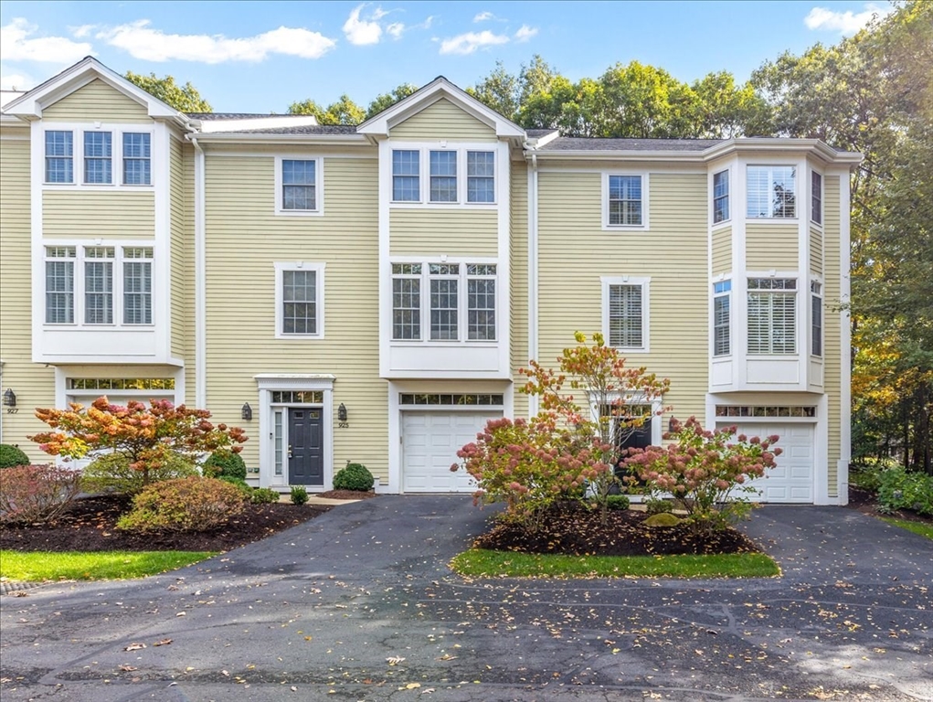 923 Lagrange Street, Unit 923 Boston, MA 02132 - Photo 3 of 32 a front view of a house with garden