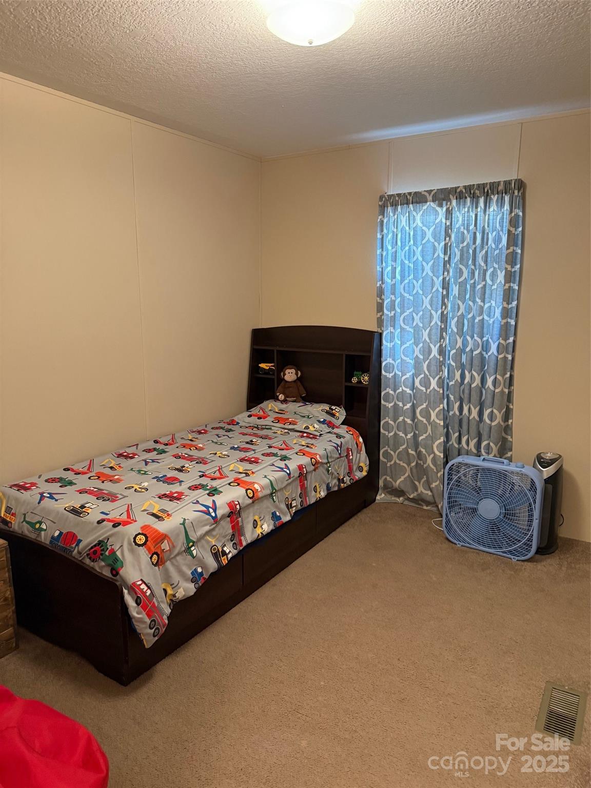 891 Longbranch Road Jefferson, SC 29718 - Photo 12 of 21 a bedroom with a bed and a window