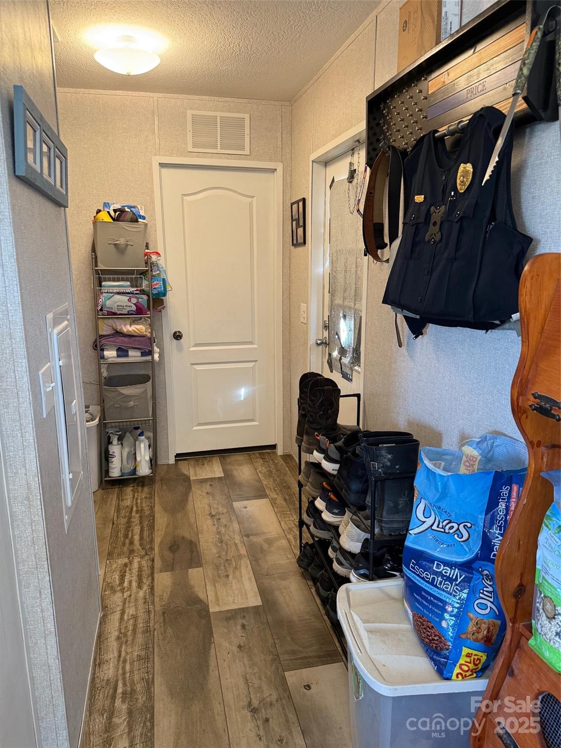 891 Longbranch Road Jefferson, SC 29718 - Photo 16 of 21 a living room with furniture and a closet