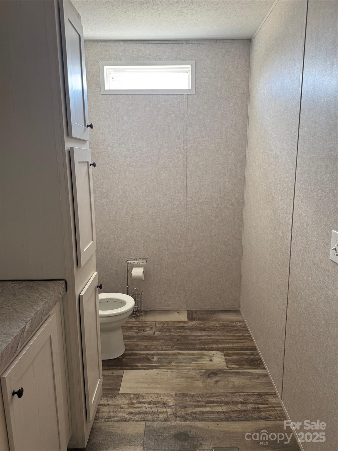 891 Longbranch Road Jefferson, SC 29718 - Photo 19 of 21 a bathroom with a toilet and a shower