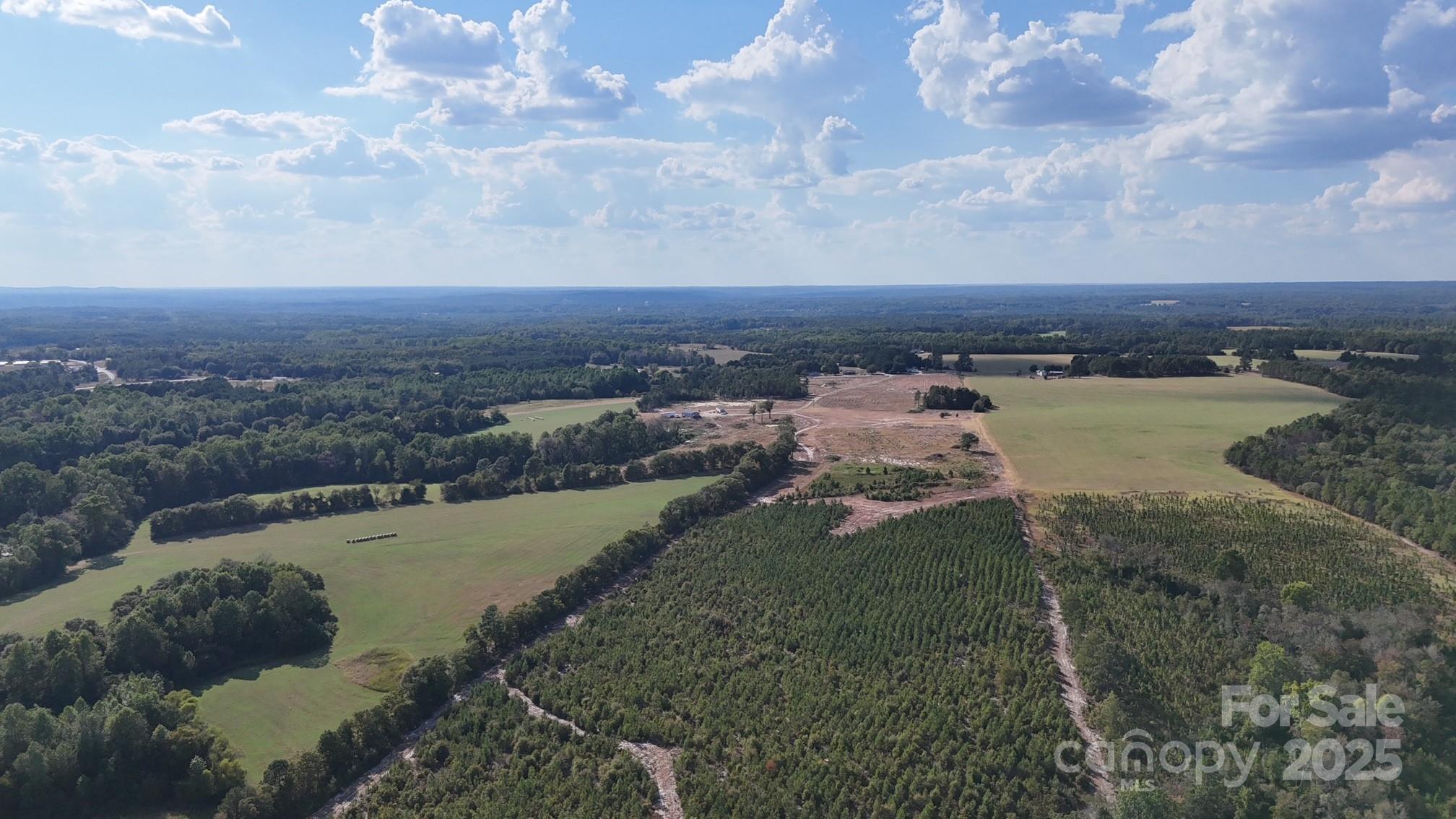 891 Longbranch Road Jefferson, SC 29718 - Photo 8 of 21 a view of a lake with a city