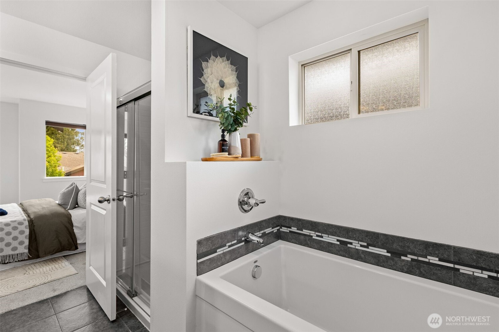 16516 2nd Park Southeast Bothell, WA 98012 - Photo 25 of 39 a bathroom with a bathtub and a window