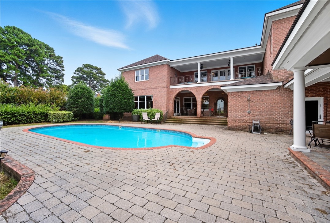 2328 Spindrift Road Virginia Beach, VA 23451 - Photo 44 of 50 Swimming pool with a patio and a balcony