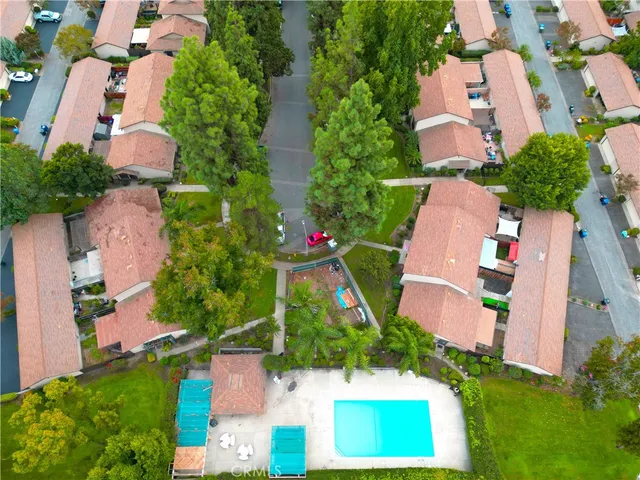 an aerial view of house with yard