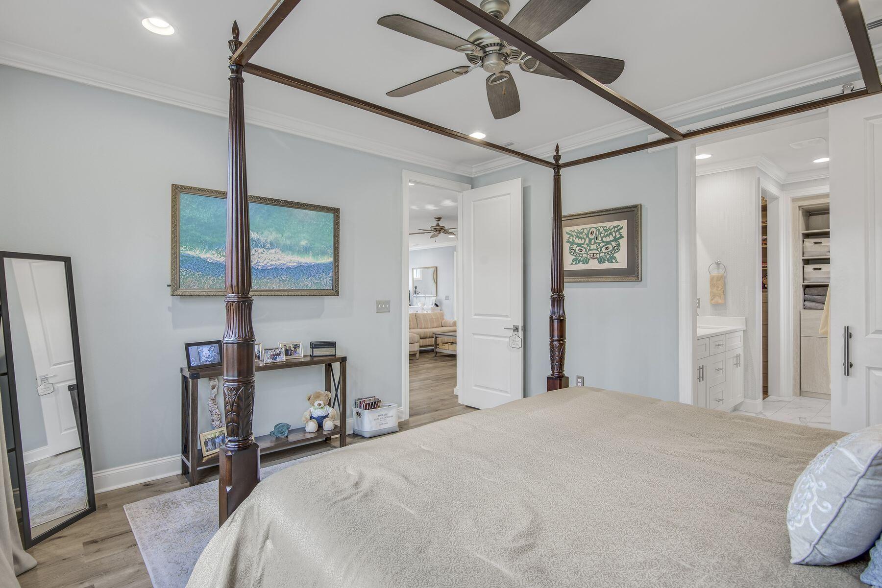 149 Windrow Way Watersound, FL 32461 - Photo 15 of 27 a bedroom with a bed and a desk