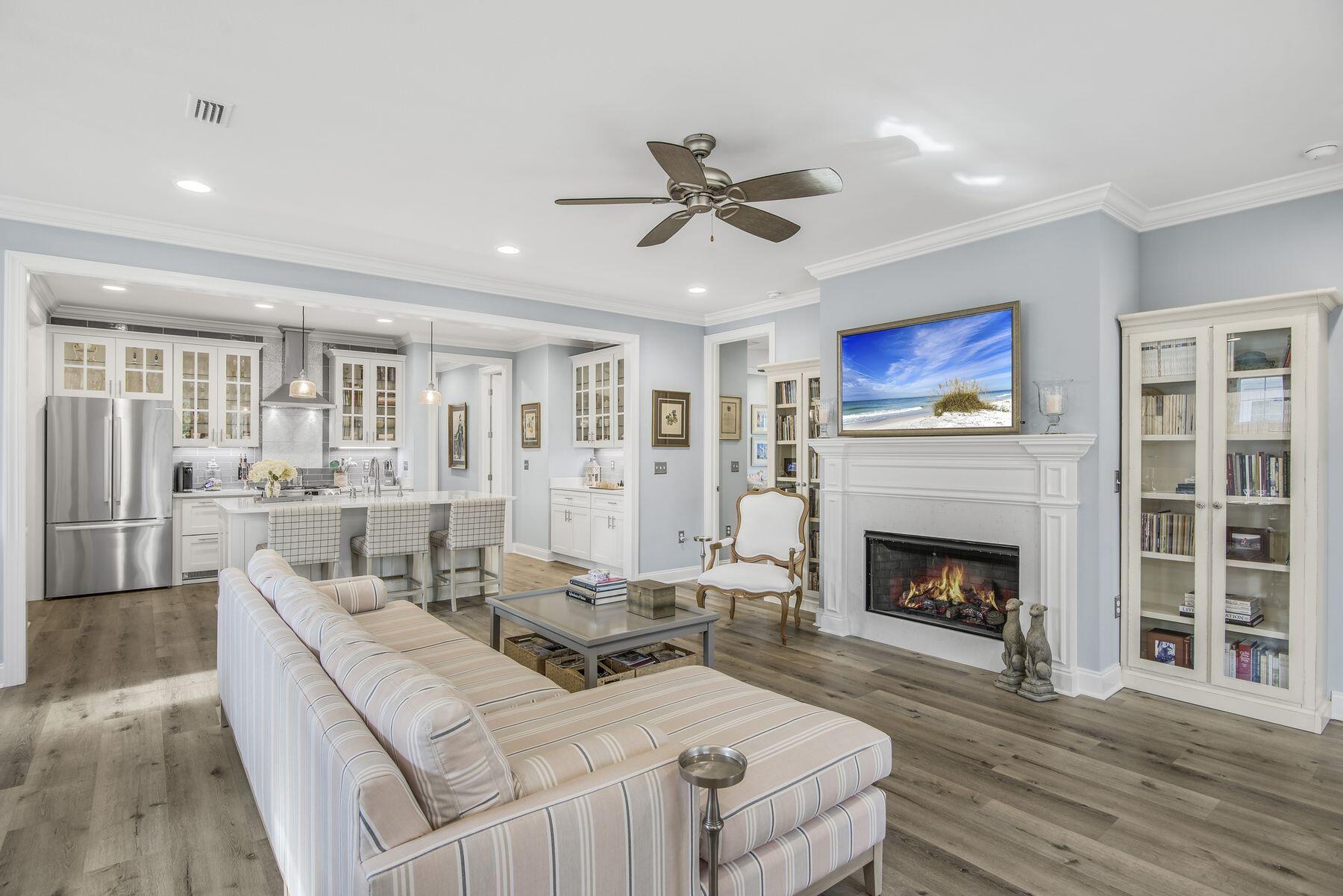 149 Windrow Way Watersound, FL 32461 - Photo 7 of 27 a living room with furniture and a fireplace