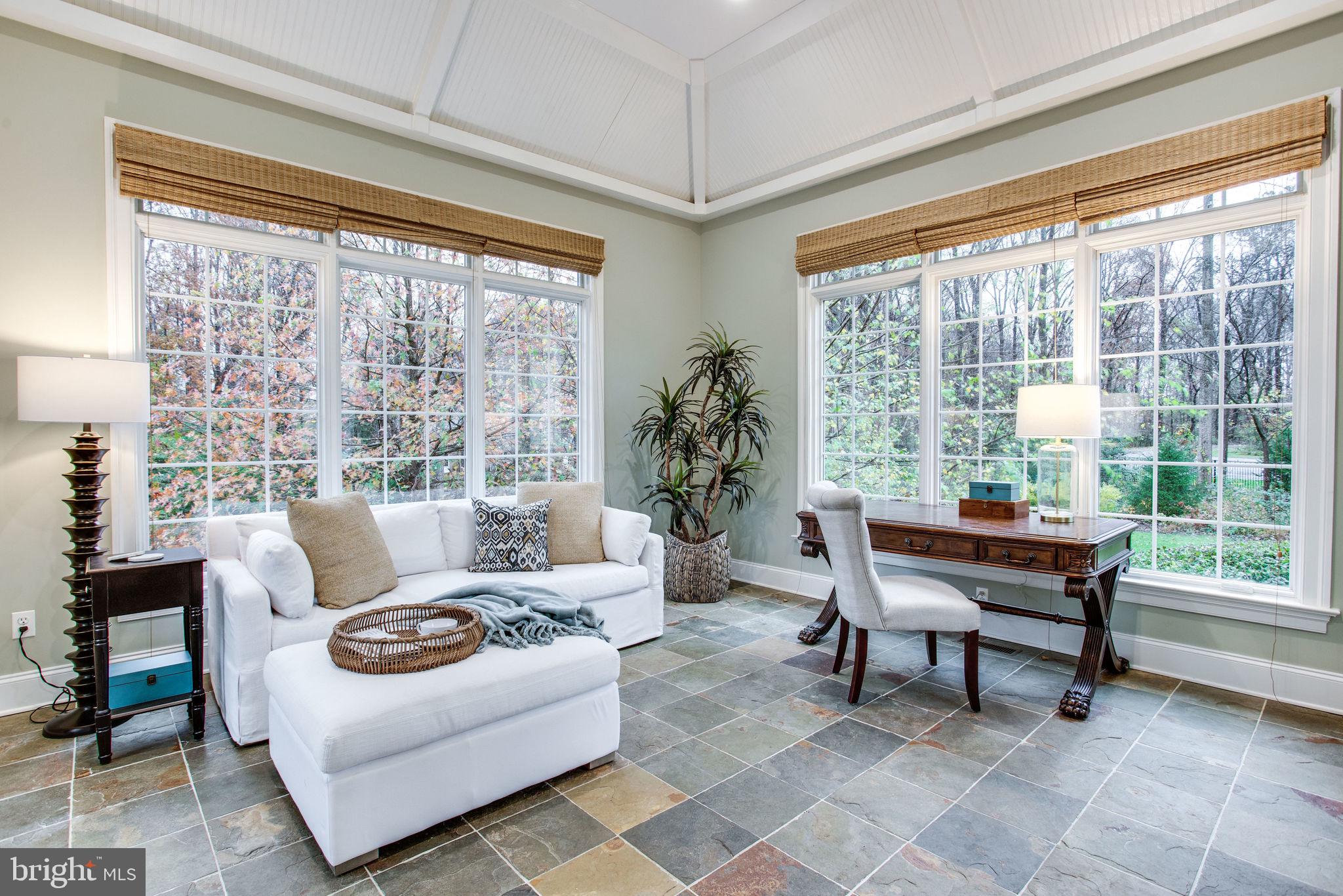 10464 Springvale Meadow Lane Great Falls, VA 22066 - Photo 29 of 103 Sunroom w/ soaring architectural ceiling