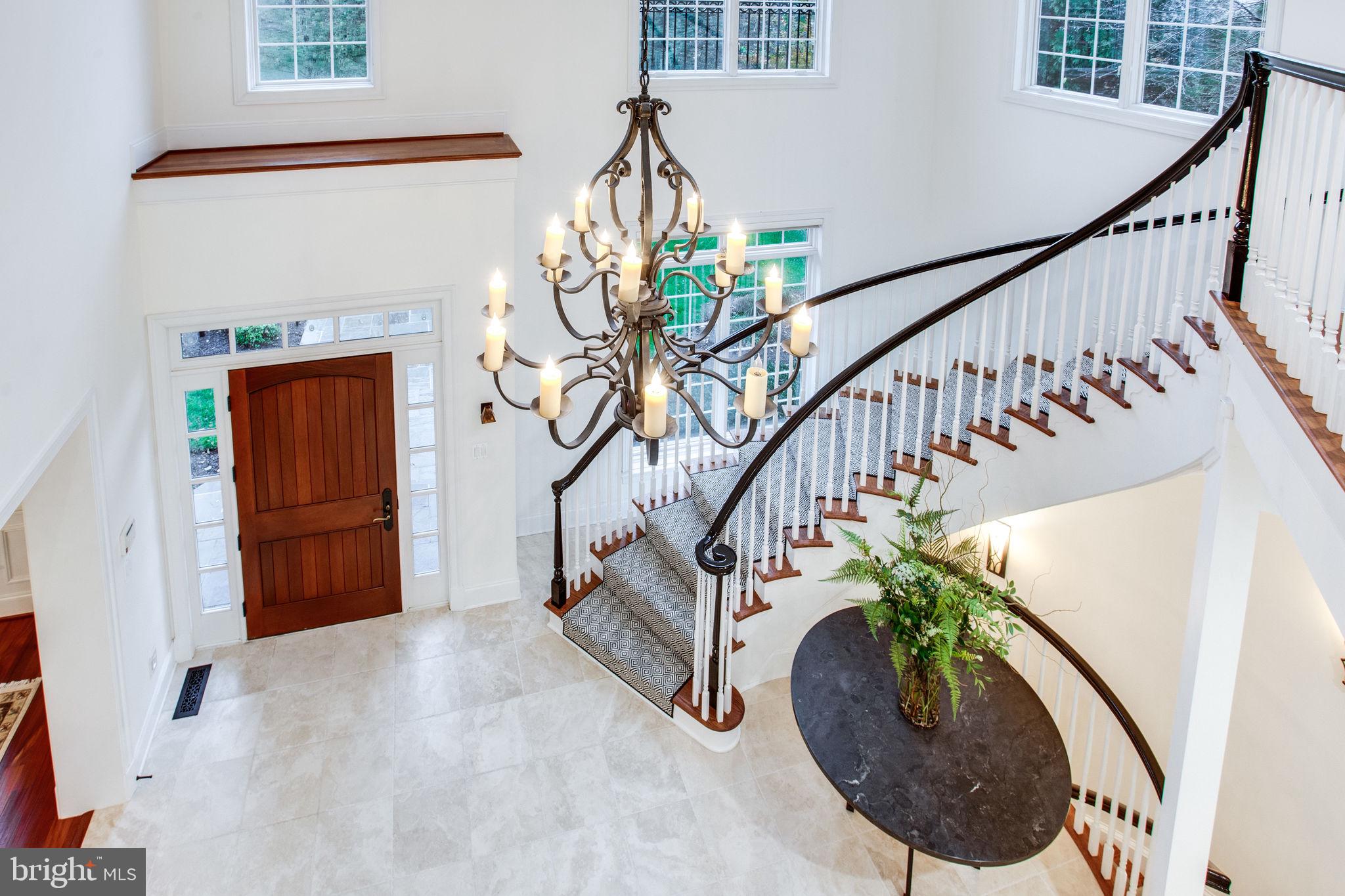 10464 Springvale Meadow Lane Great Falls, VA 22066 - Photo 34 of 103 Beautiful curved floating staircase