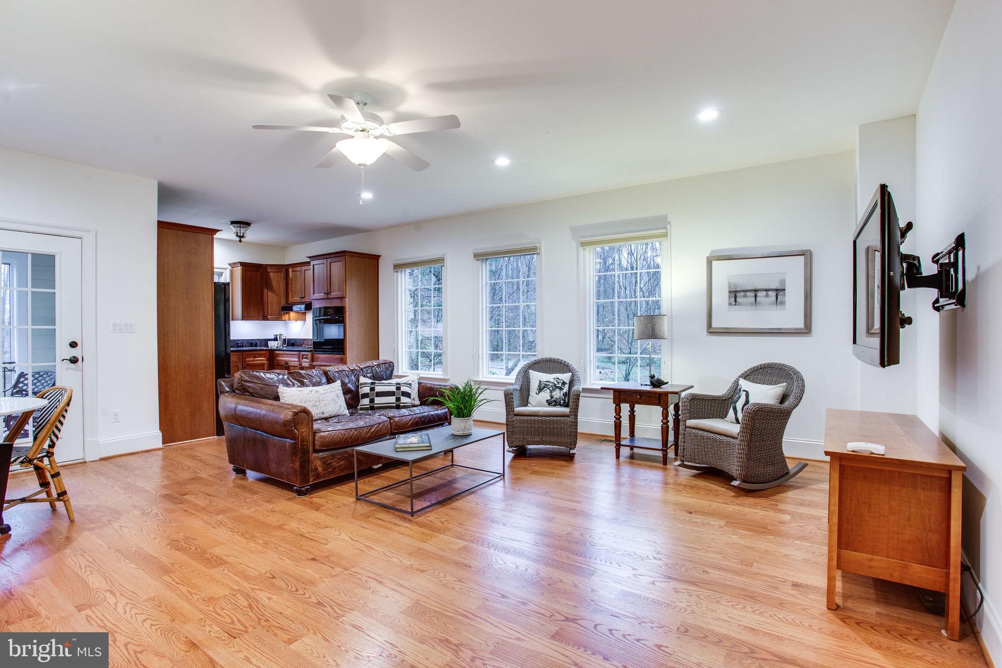 10464 Springvale Meadow Lane Great Falls, VA 22066 - Photo 75 of 103 Guest House Great Room