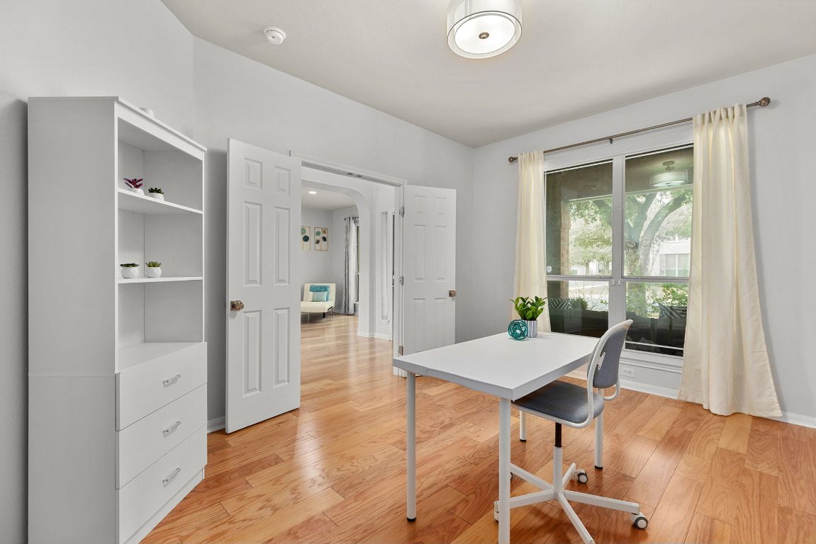 701 Old Ravine Court Round Rock, TX 78665 - Photo 14 of 40 Office with light wood finished floors and arched walkways