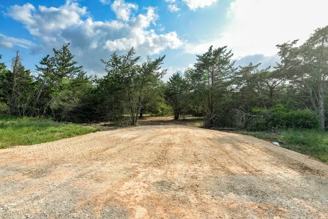 a view of a backyard of a house