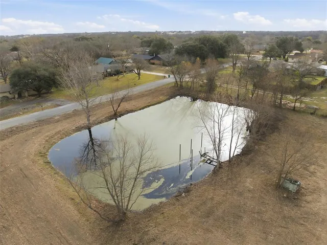 a view of a swimming pool with a lake