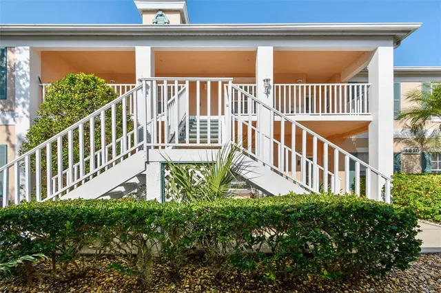 a view of a porch with a bench