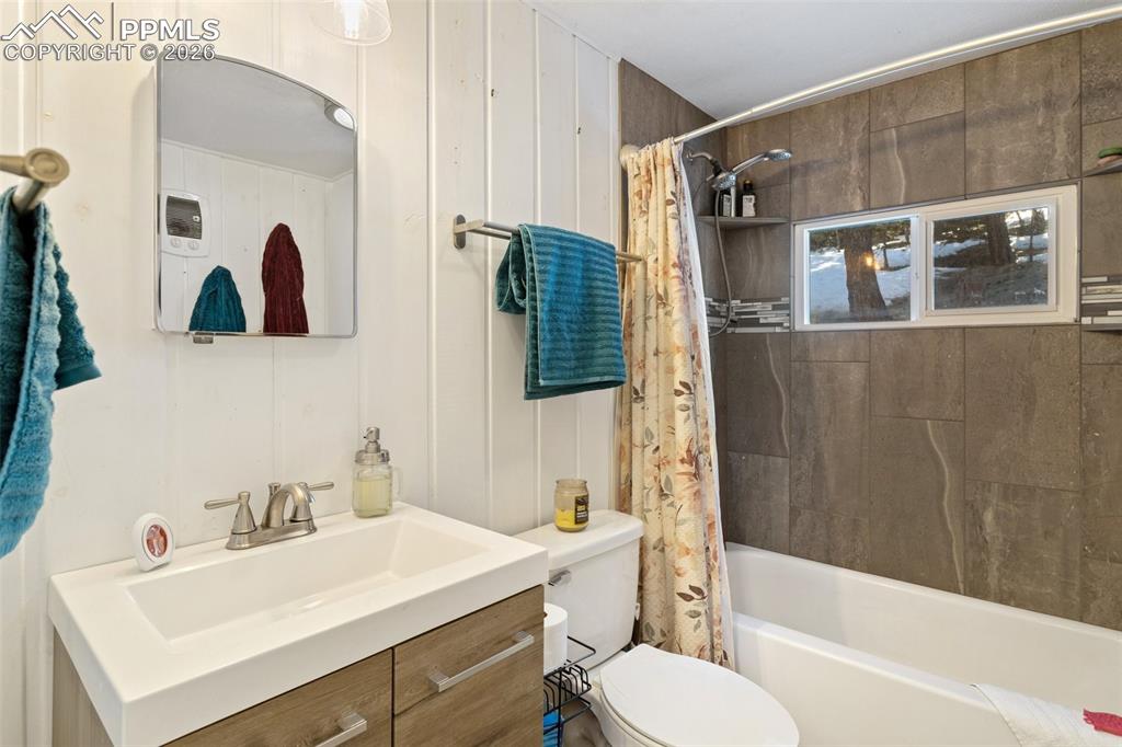 6230 Waterfall Loop Manitou Springs, CO 80829 - Photo 15 of 22 a bathroom with a sink a toilet and shower