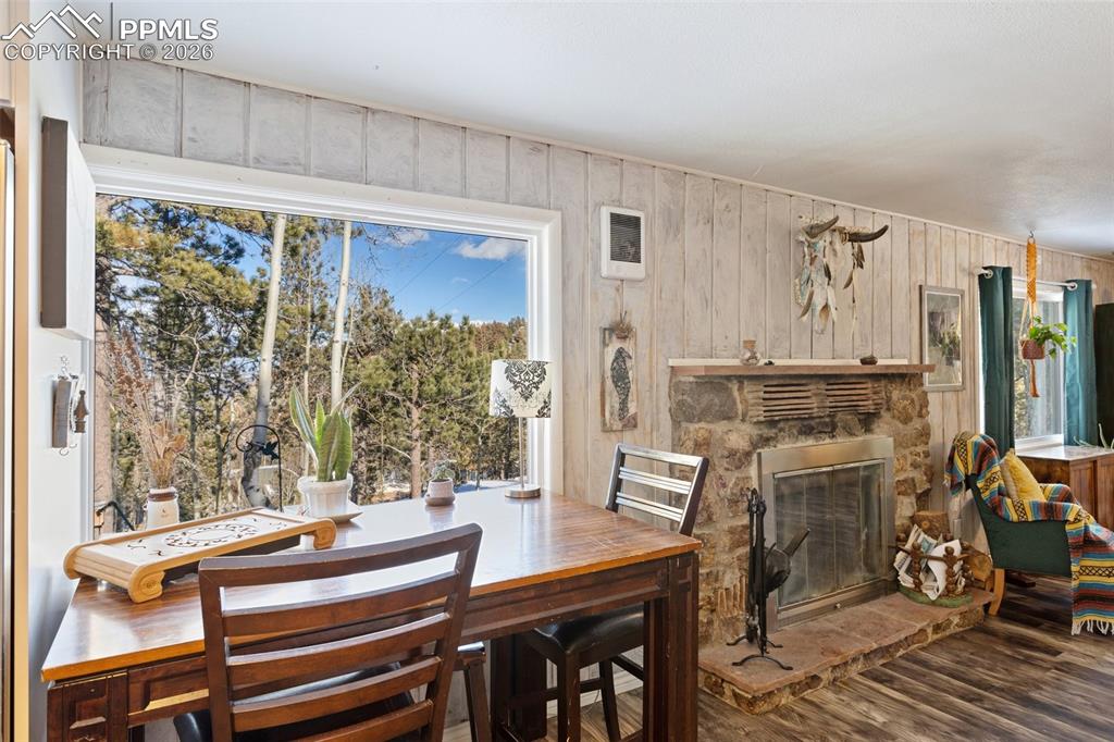 6230 Waterfall Loop Manitou Springs, CO 80829 - Photo 5 of 22 a view of a dining room with furniture window and outside view