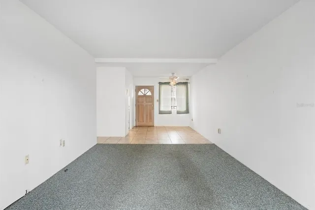 a kitchen with cabinets appliances a sink and a counter top