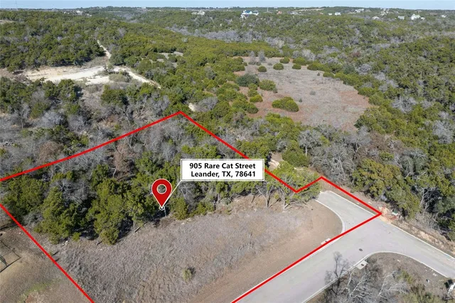 a view of a street with a sign board