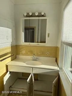 a bathroom with a sink and a bathtub