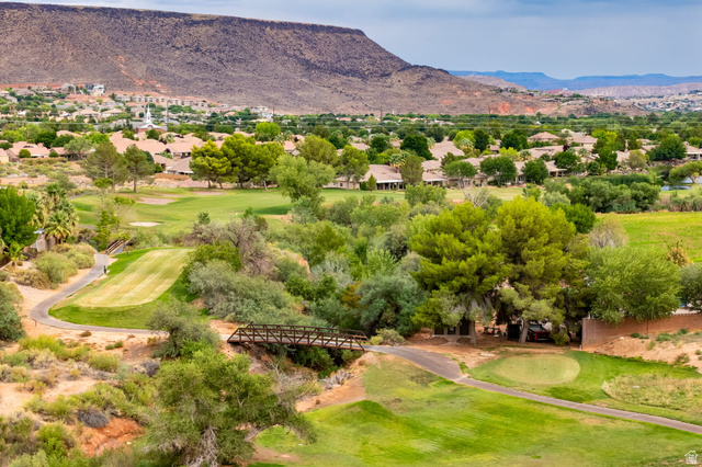 271 North Country Lane, Unit 60 St. George, UT 84770 - Photo 14 of 17 Mountain view featuring a golf club and nearby suburban area