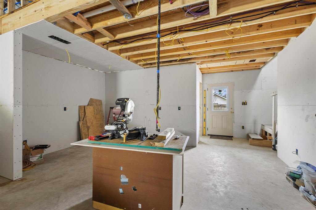 204 South Main Street Ector, TX 75439 - Photo 7 of 18 a room with gym equipment
