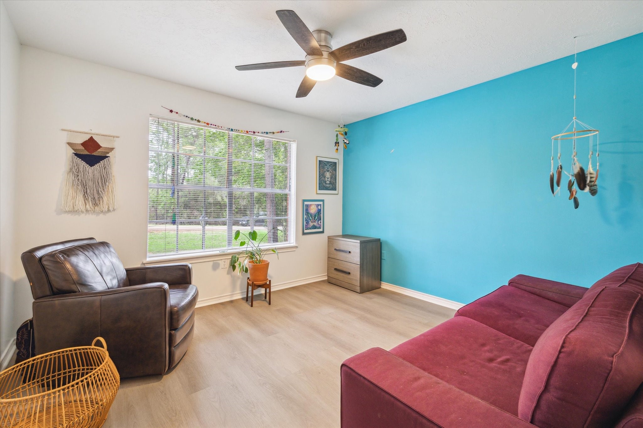 2420 Canter Lane Conroe, TX 77384 - Photo 14 of 24 a living room with furniture and a window