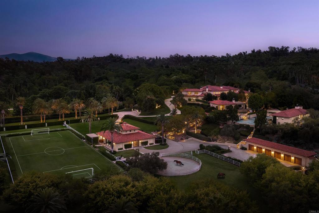6853 Rancho Valencia Road Rancho Santa Fe, CA 92067 - Photo 27 of 29 an aerial view of a house with a garden