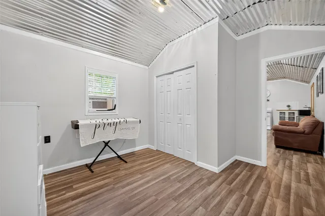 a view of a room with stairs and a bathroom