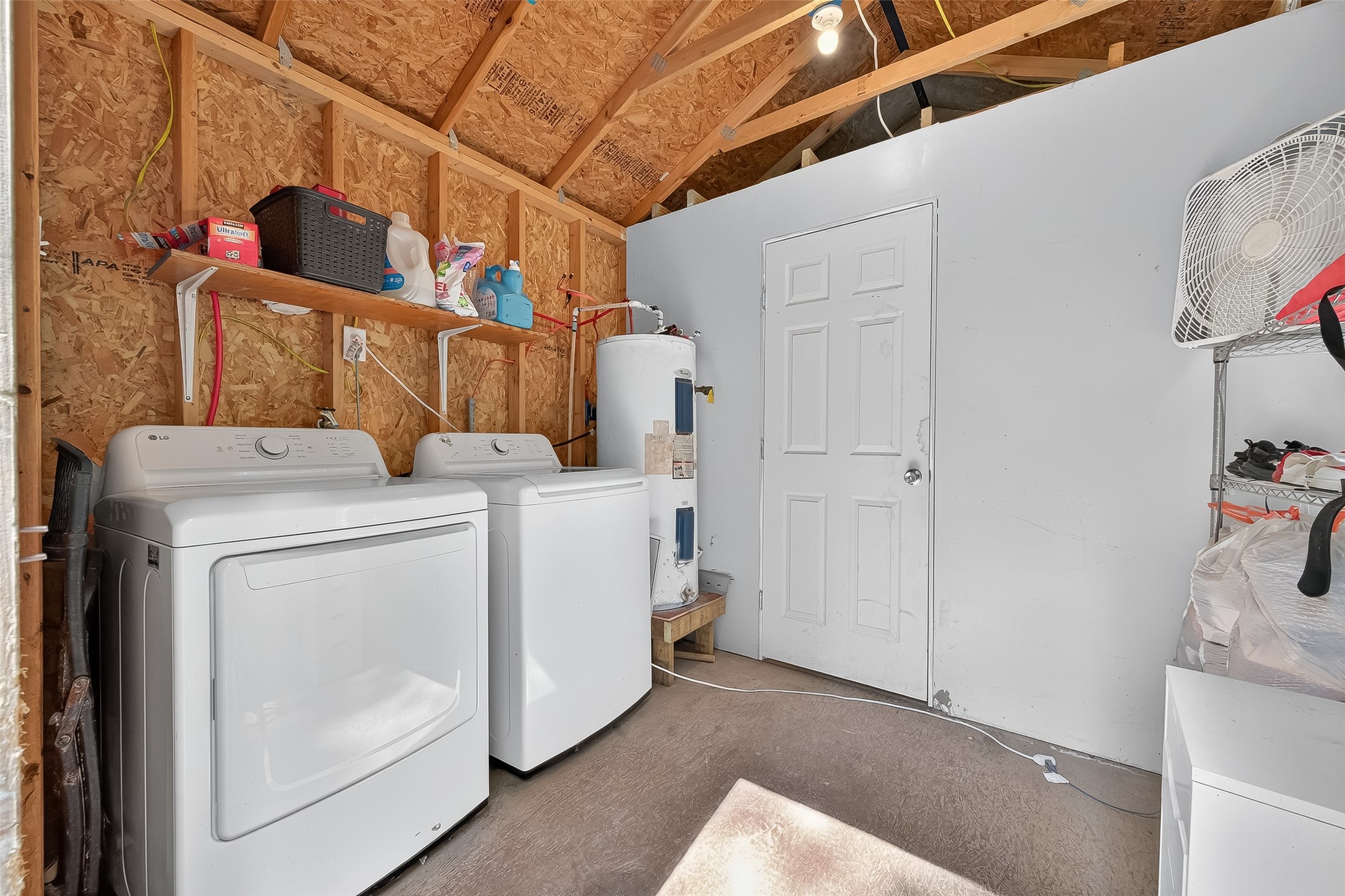 200 Our Road Shepherd, TX 77371 - Photo 22 of 46 a utility room with dryer and washer
