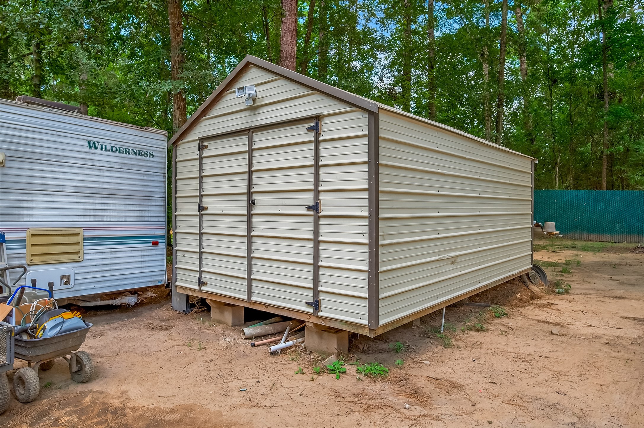 200 Our Road Shepherd, TX 77371 - Photo 24 of 46 a view of a house with a yard