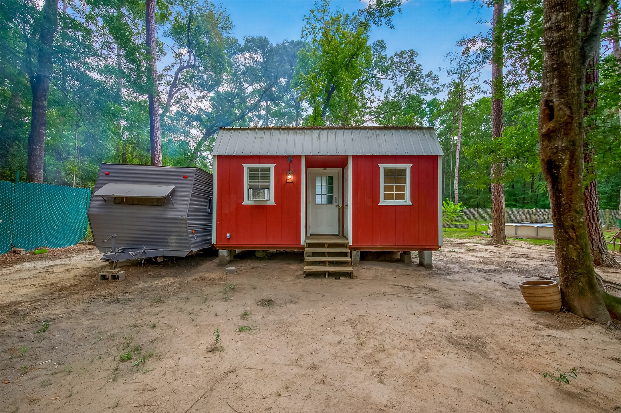 200 Our Road Shepherd, TX 77371 - Photo 26 of 46 a view of a house with a yard