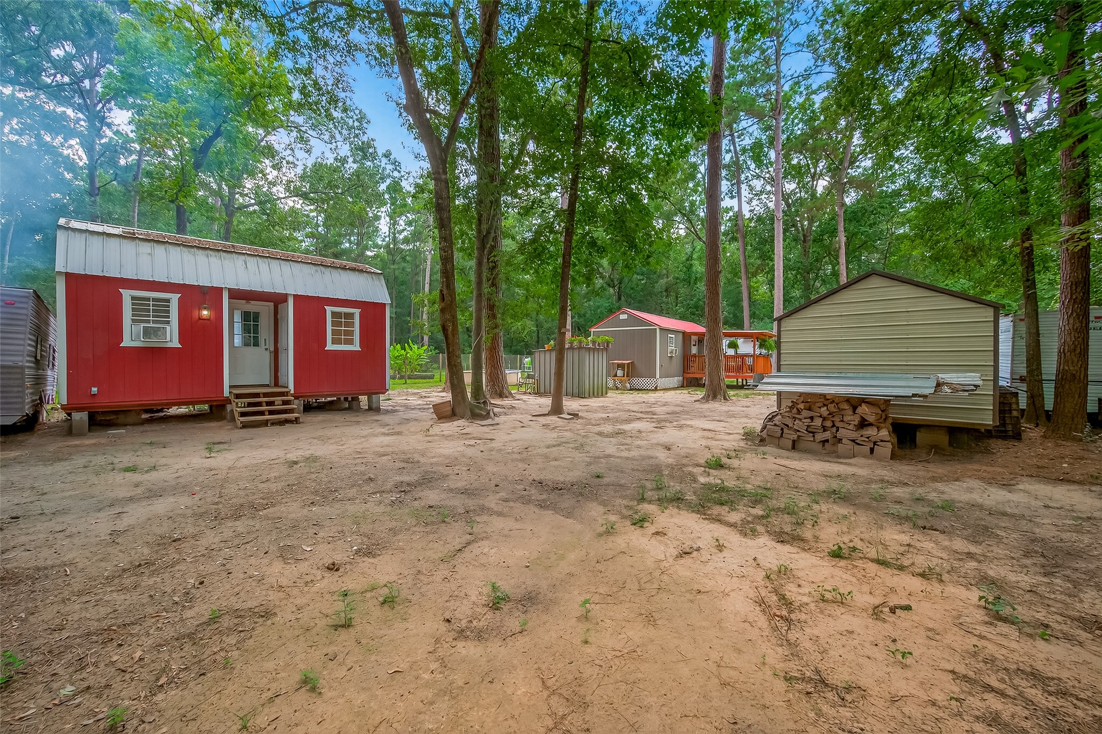 200 Our Road Shepherd, TX 77371 - Photo 27 of 46 a view of a house with backyard and trees