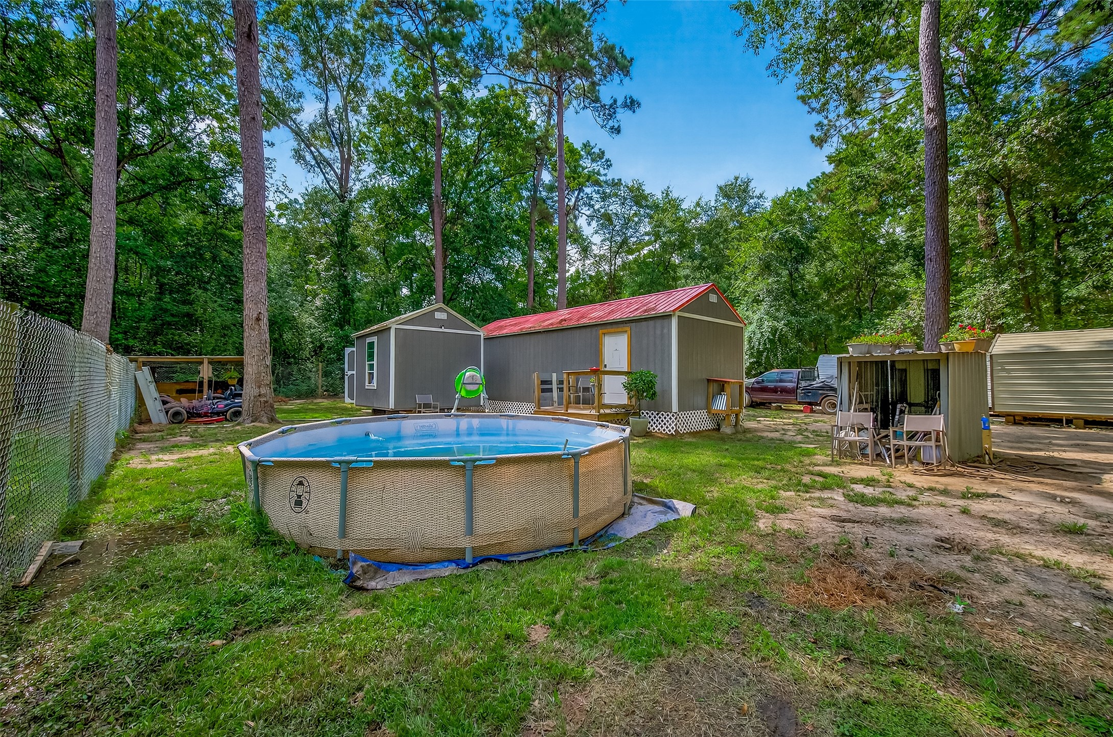 200 Our Road Shepherd, TX 77371 - Photo 29 of 46 a view of a house with backyard sitting area and garden