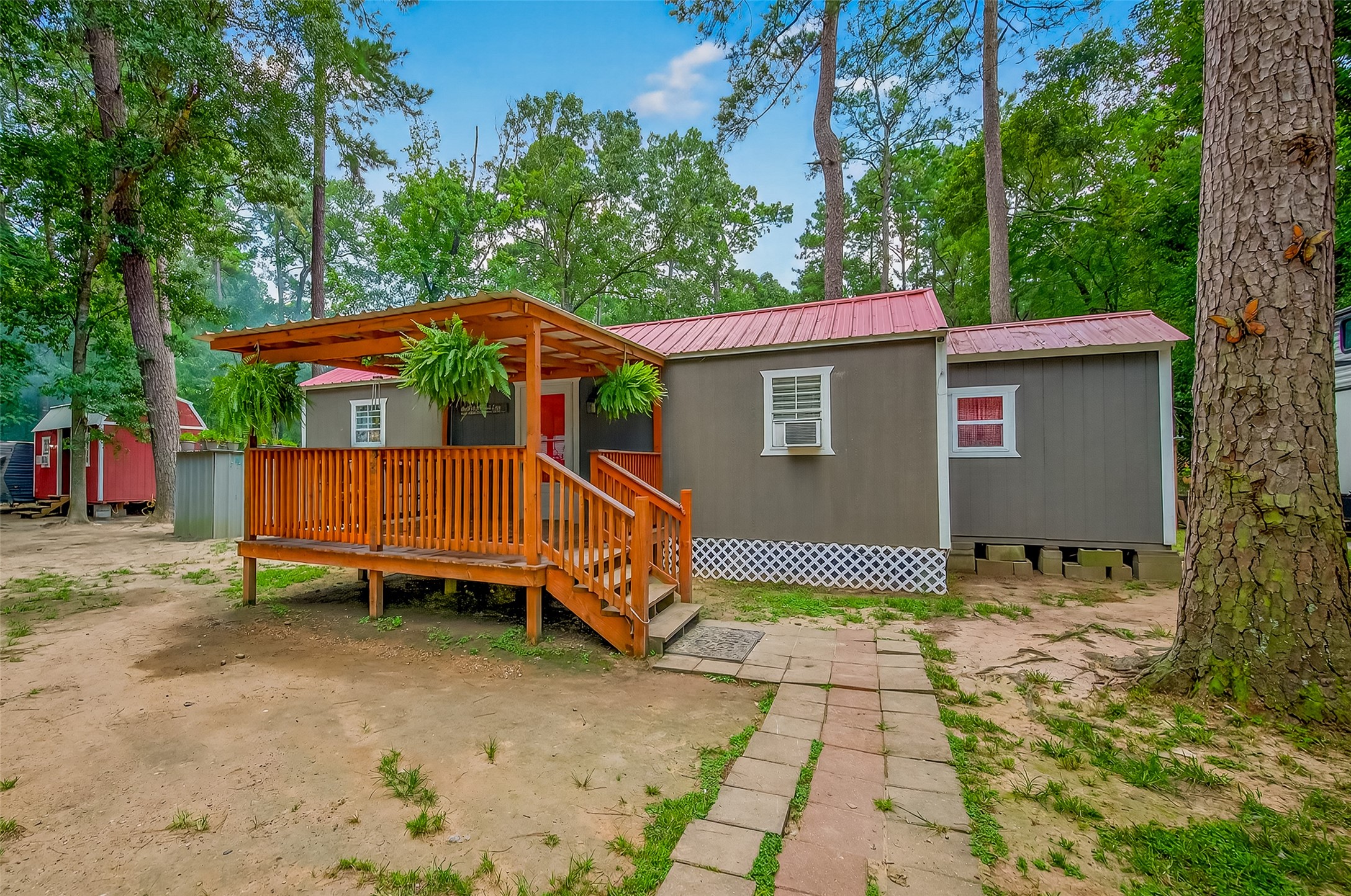 200 Our Road Shepherd, TX 77371 - Photo 3 of 46 a view of a house with a yard
