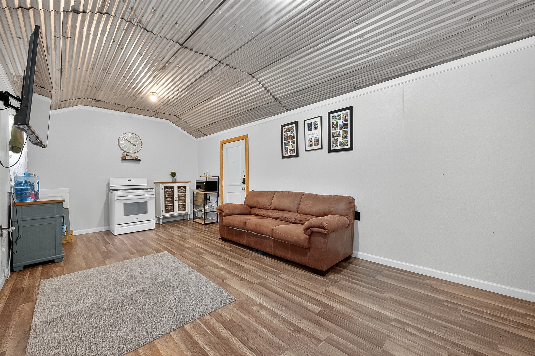 200 Our Road Shepherd, TX 77371 - Photo 8 of 46 a living room with furniture and a wooden floor