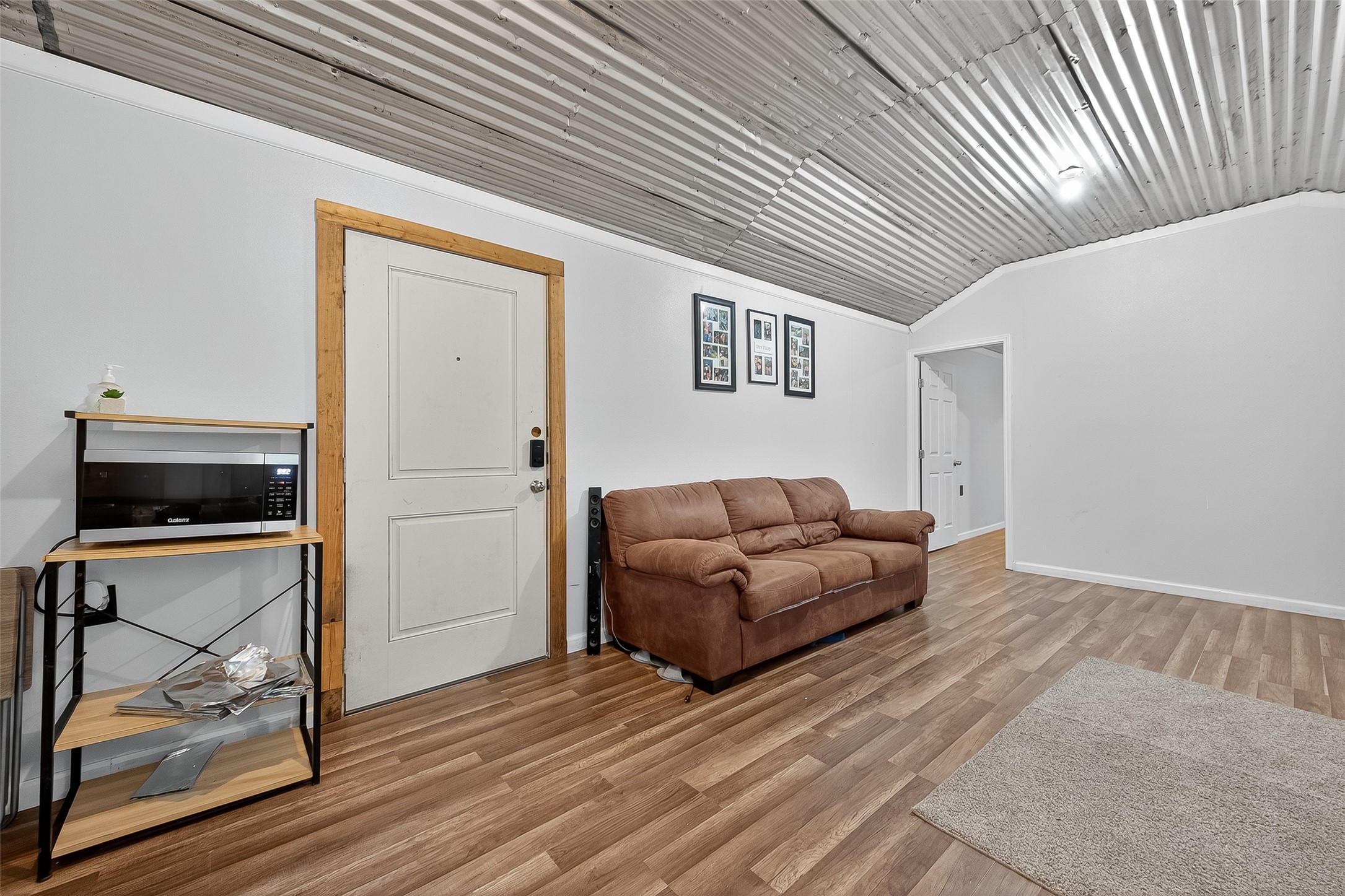 200 Our Road Shepherd, TX 77371 - Photo 9 of 46 a living room with furniture and a wooden floor