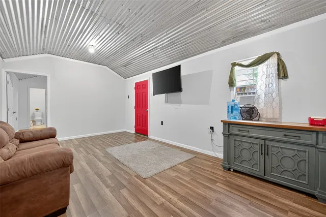 a kitchen that has a lot of cabinets in it