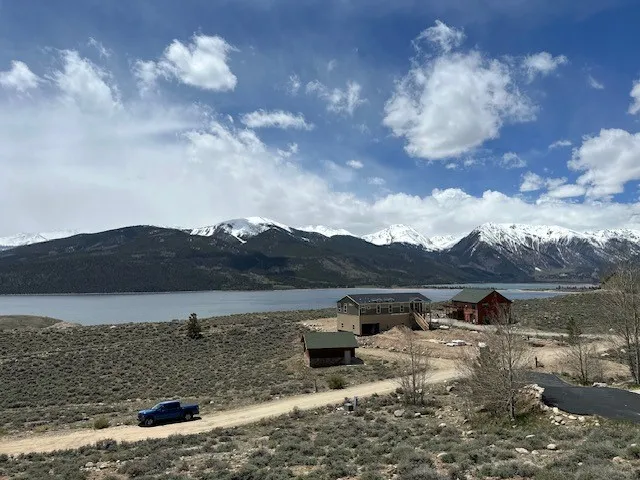 a view of a lake with a mountain in the background