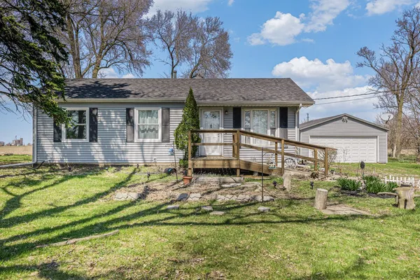 a kitchen with stainless steel appliances granite countertop a refrigerator and a stove