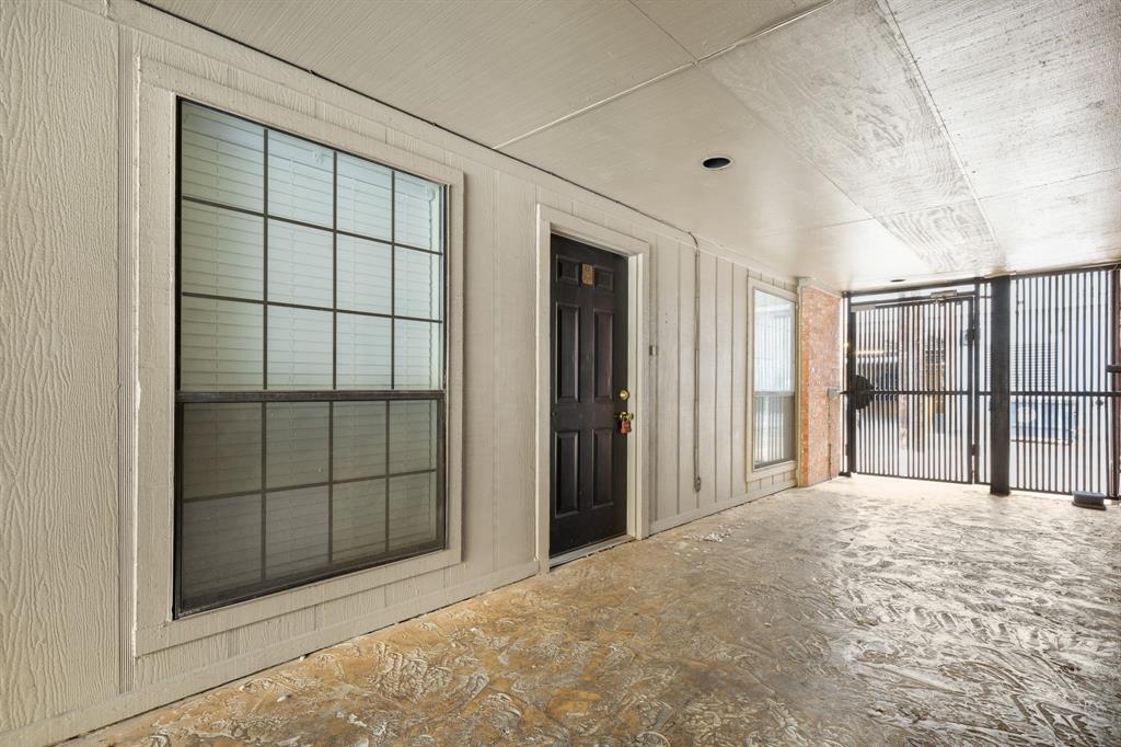 2401 Leon Street, Unit 105 Austin, TX 78705 - Photo 17 of 18 a view of empty room with windows