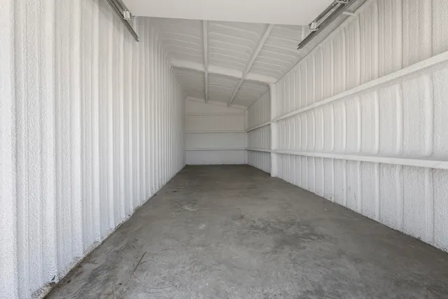 en empty room with windows