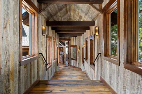 a view of a house with wooden stairs