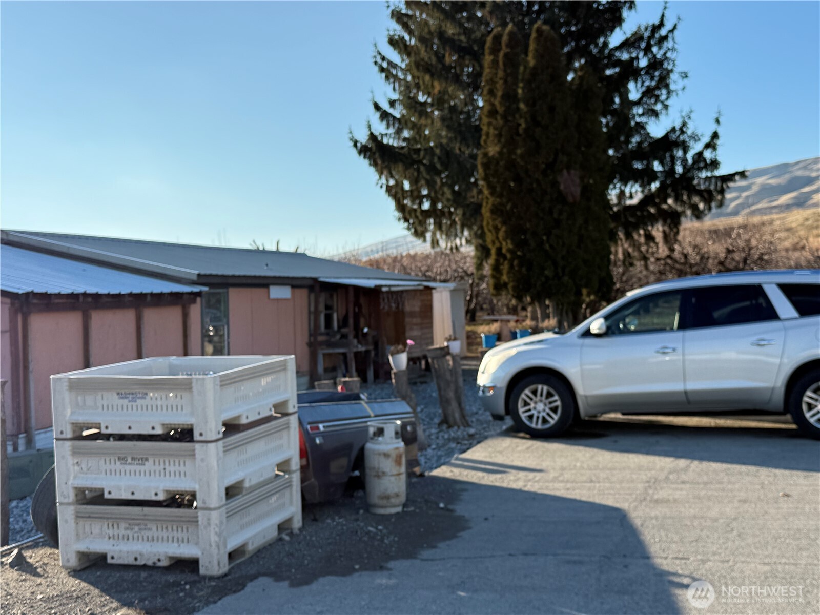 556 Jack Wells Road Bridgeport, WA 98813 - Photo 11 of 13 a view of a car parked in garage