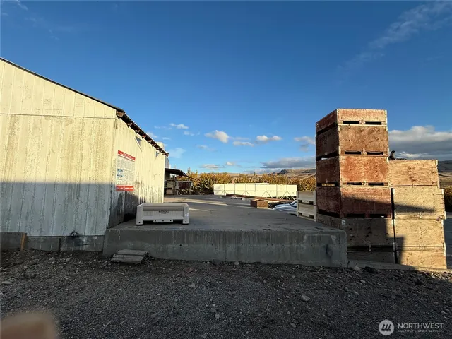 a view of a back yard of the house