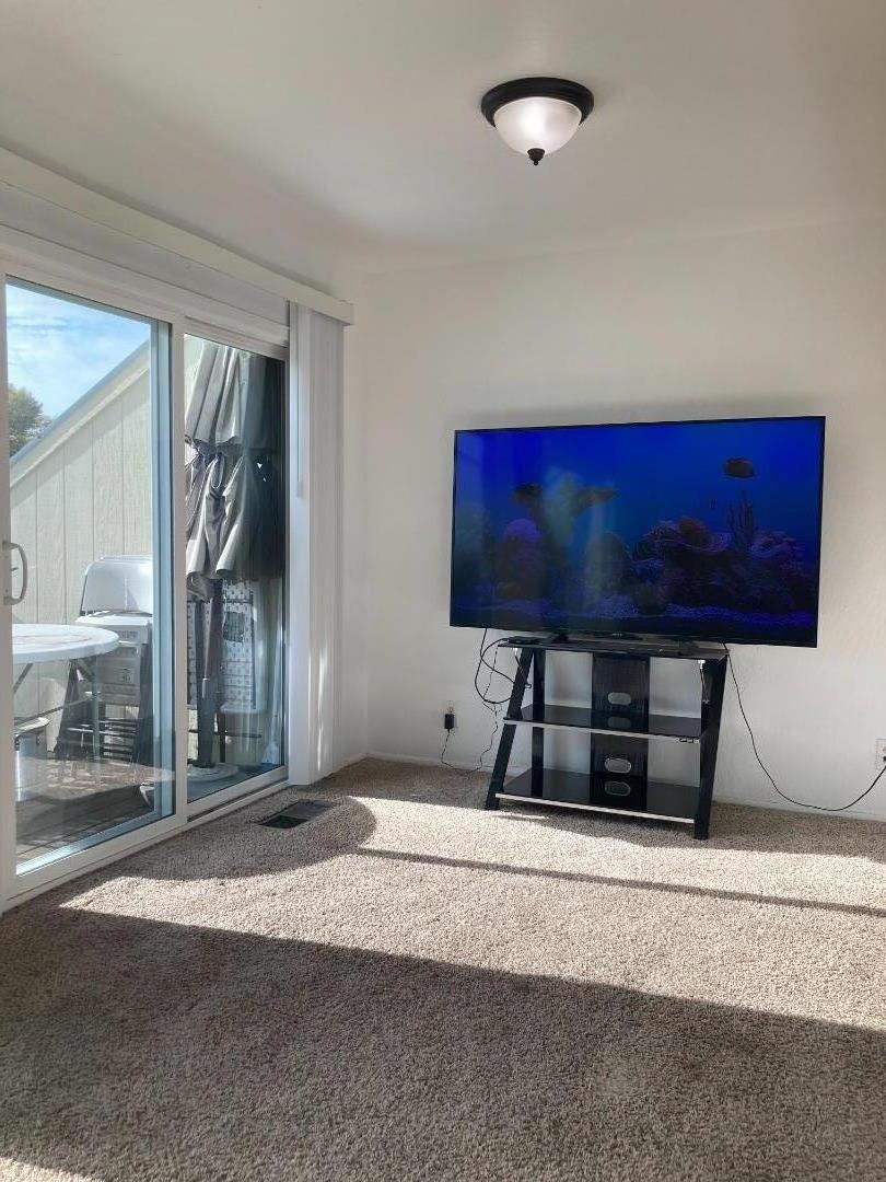 3660 Wells Road Oakley, CA 94561 - Photo 15 of 63 a living room with furniture and a flat screen tv