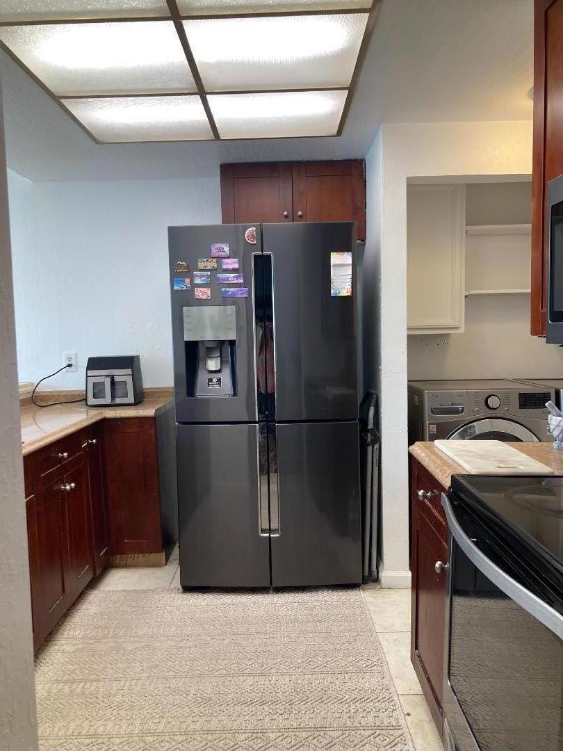 3660 Wells Road Oakley, CA 94561 - Photo 21 of 63 a kitchen with stainless steel appliances granite countertop a refrigerator and a sink
